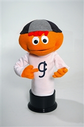 Gerbert is a small cartoon puppet with tangerine skin, red yarn hair, and two tone beanie.