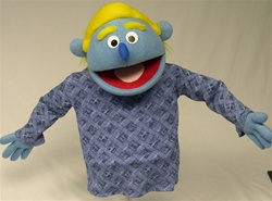 Blue boy puppet with yellow hair named "Bobby".